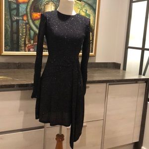 Sparkle long sleeve dress with cut out back.